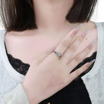 Classic 4-Prong Solitaire Ring with Micro-Pavé Accent Stones & Crisscross Band - 925 Silver Plated White Gold Engagement Promise