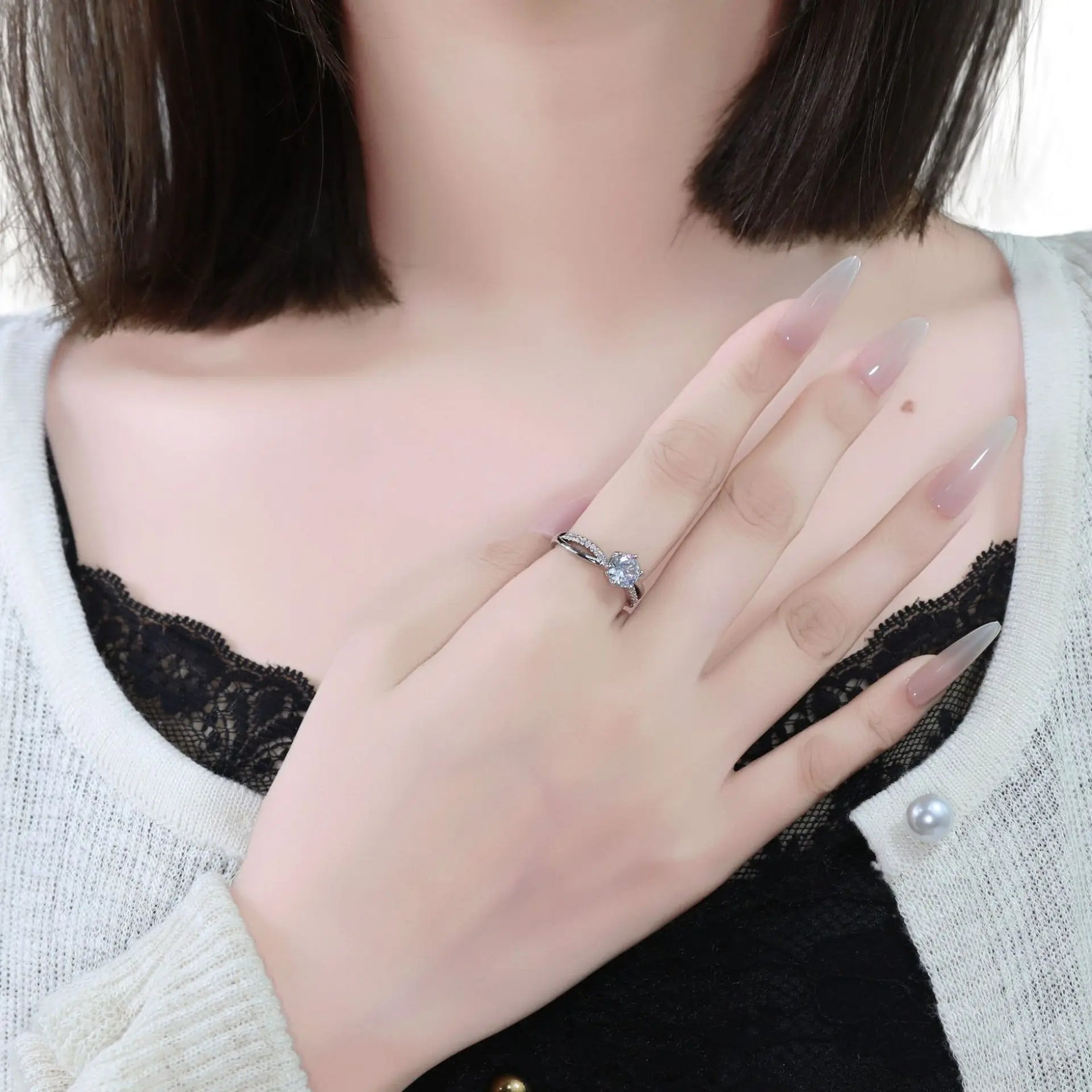 Classic 4-Prong Solitaire Ring with Micro-Pavé Accent Stones & Crisscross Band - 925 Silver Plated White Gold Engagement Promise