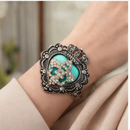 FLEUR DE LIS BANGLE