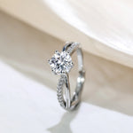 Classic 4-Prong Solitaire Ring with Micro-Pavé Accent Stones & Crisscross Band - 925 Silver Plated White Gold Engagement Promise