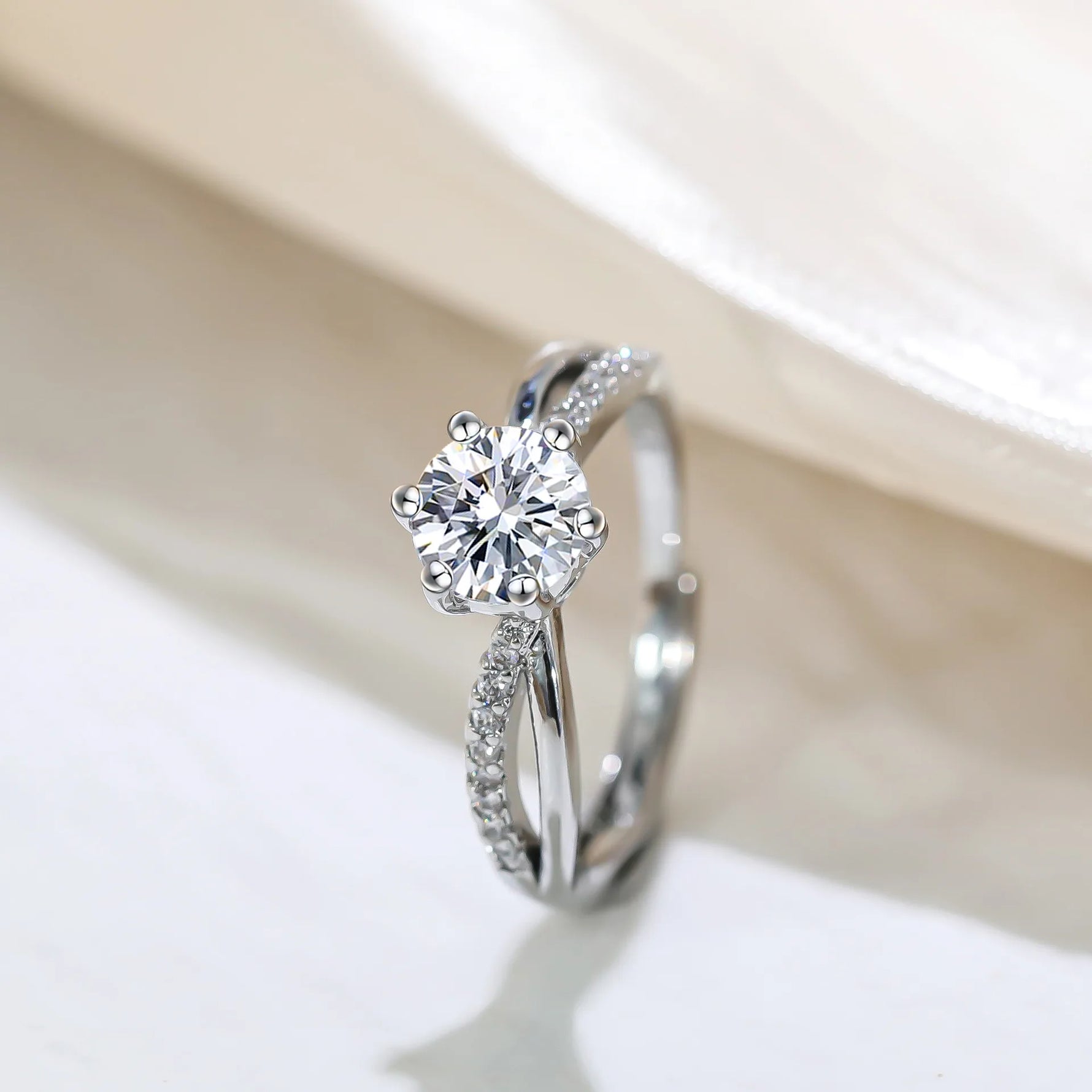 Classic 4-Prong Solitaire Ring with Micro-Pavé Accent Stones & Crisscross Band - 925 Silver Plated White Gold Engagement Promise